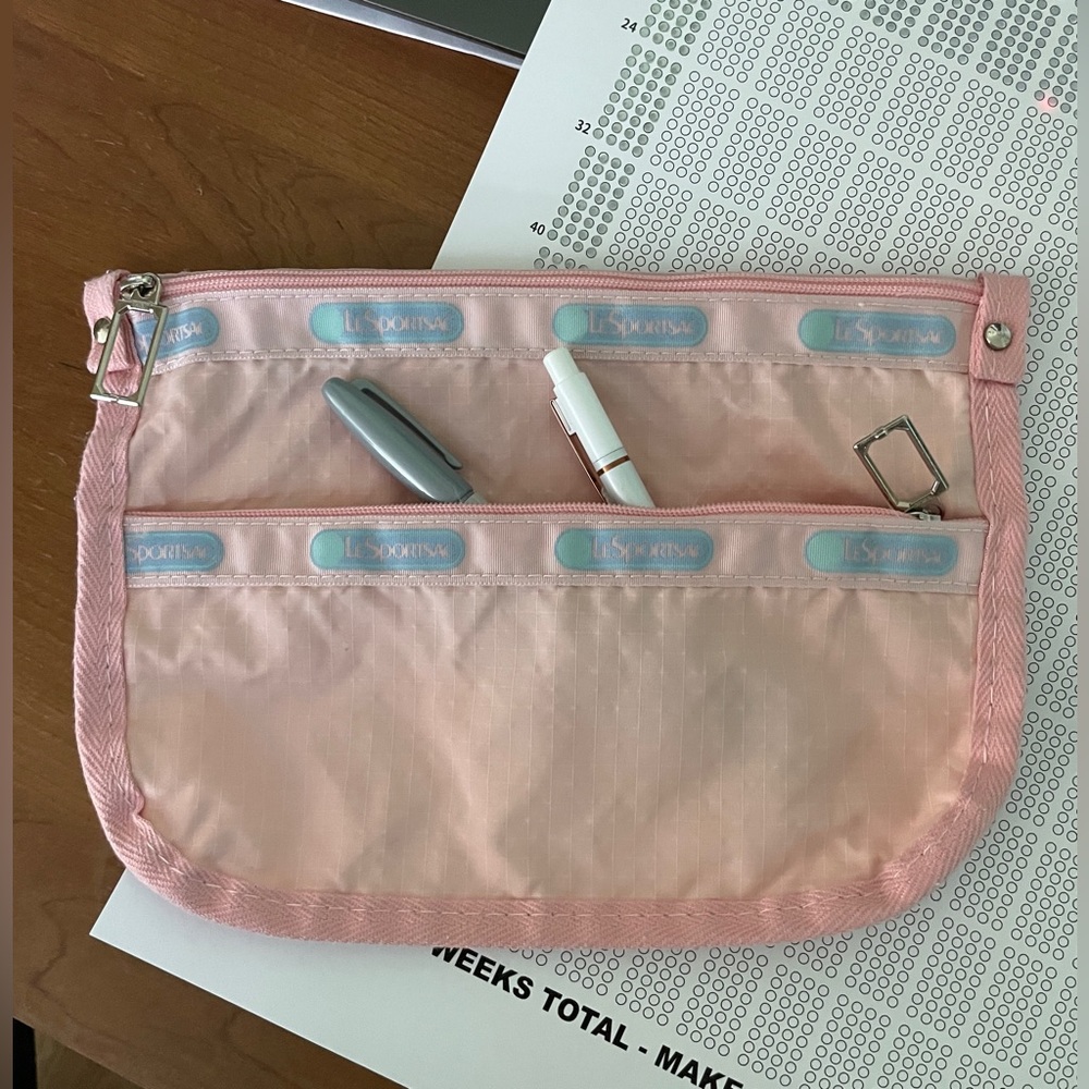 LeSportsac make-up / pencil bag. Vintage pink with blue logo.